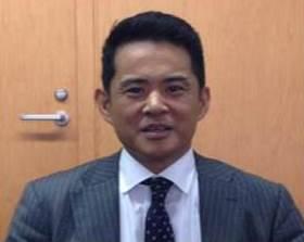 スーツ姿の代表取締役社長 大園圭一郎様の写真