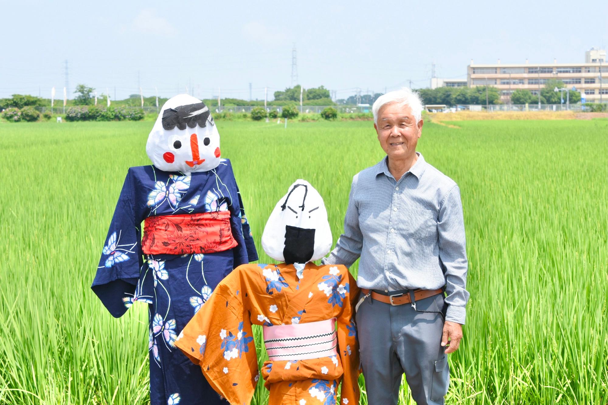 組合の代表とおにぎりのかかし