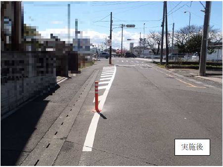 葛飾中学校通学路の路面標示の再塗布とラバーポールの設置をした写真